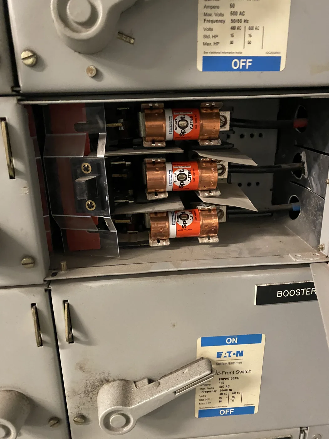 Open fused disconnect switchgear with cartridge fuses in a Toronto building electrical room