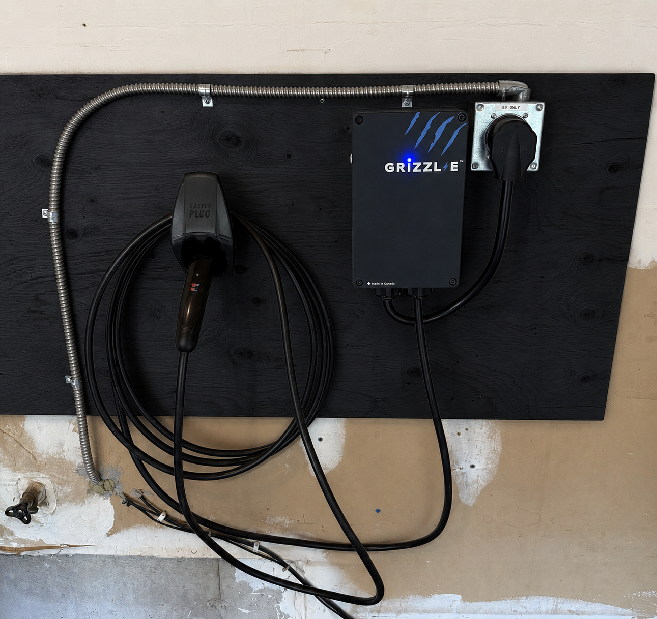 Grizzl-E charger plugged into a NEMA 14-50 outlet installed by Portman Electric Toronto