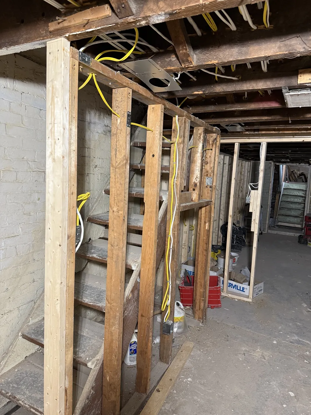 Open framing during a gut renovation of an older Kensington Market Toronto home.