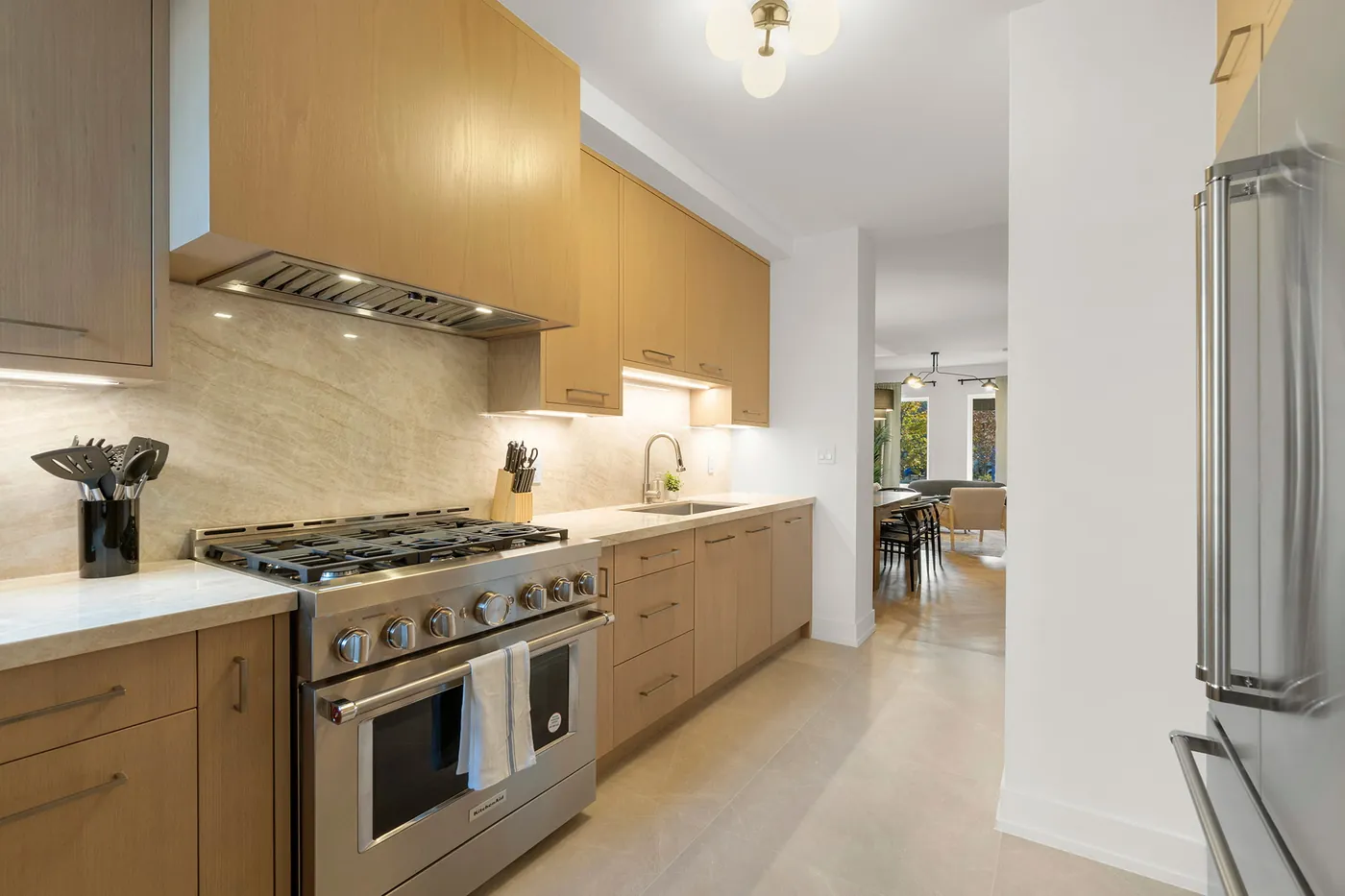 Finished kitchen after a complete electrical rewire of an older Kensington Market Toronto home.