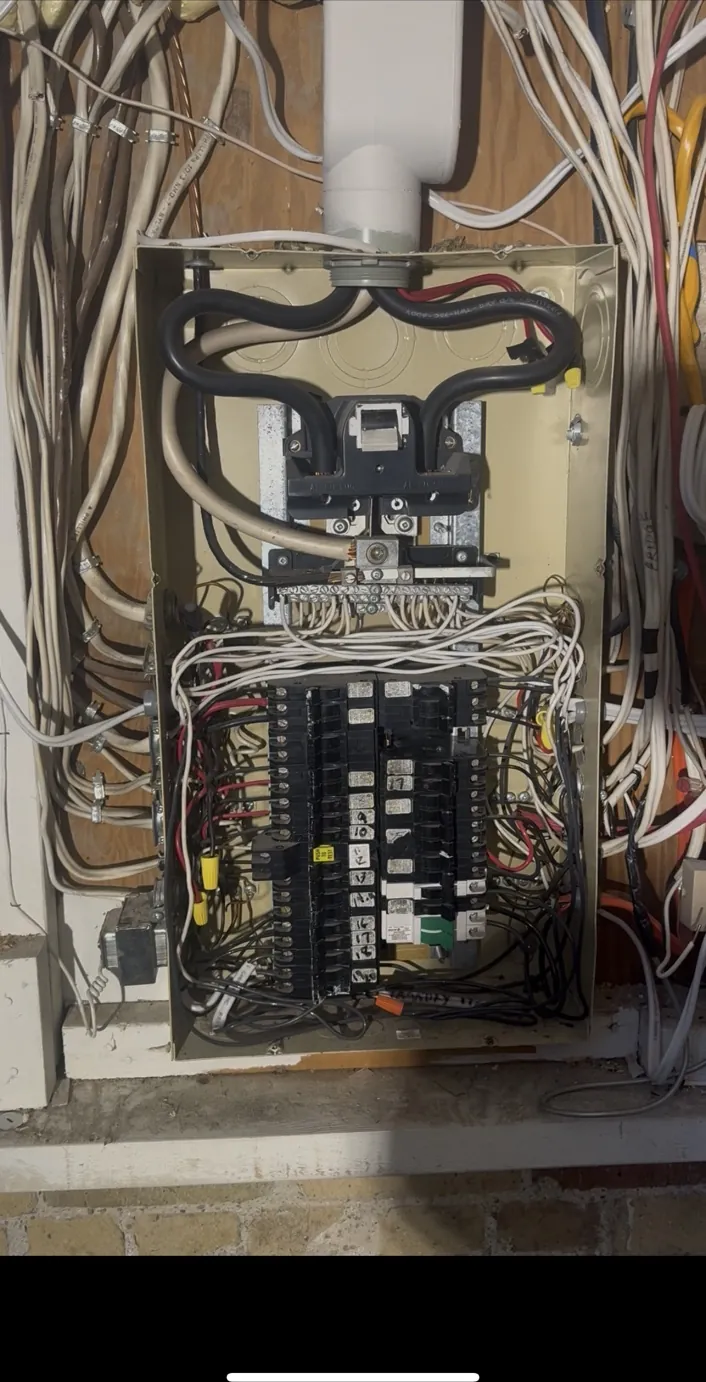 Original electrical panel before replacement at a Riverdale Toronto home.