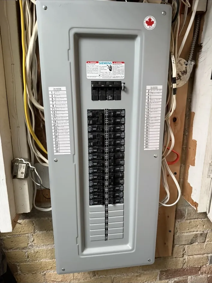 Completed Siemens electrical panel replacement in a Riverdale Toronto home.