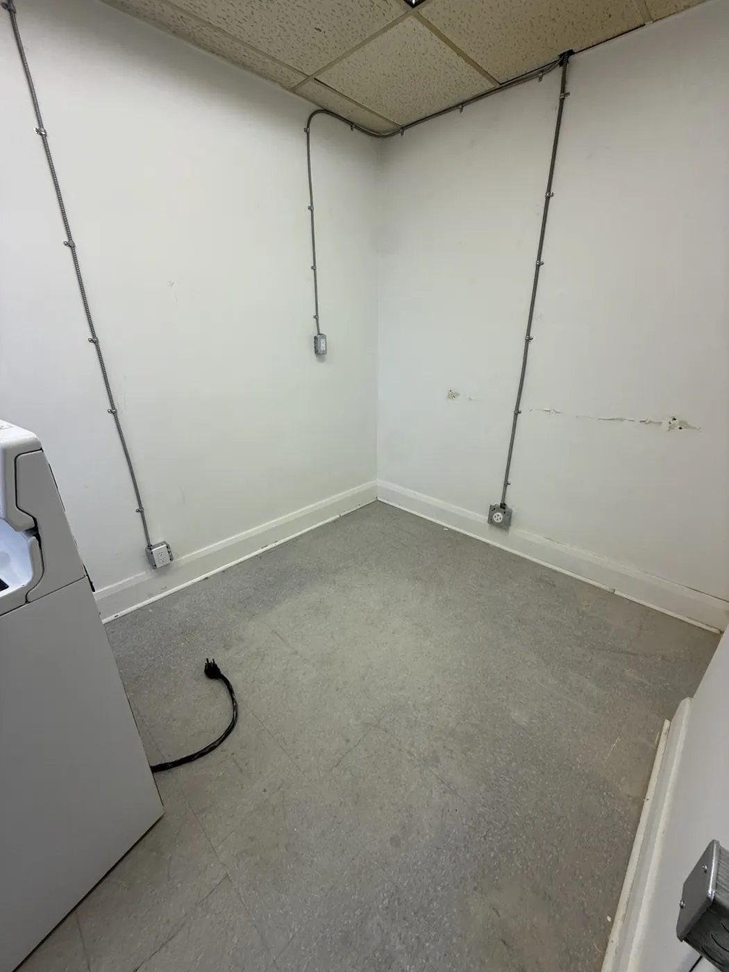 New surface-mounted conduit and receptacle circuits installed for a commercial tenant in Toronto.